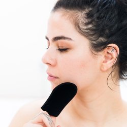 Selvbruner st: kropshandske, ansigtshandske og exfolieringshandske